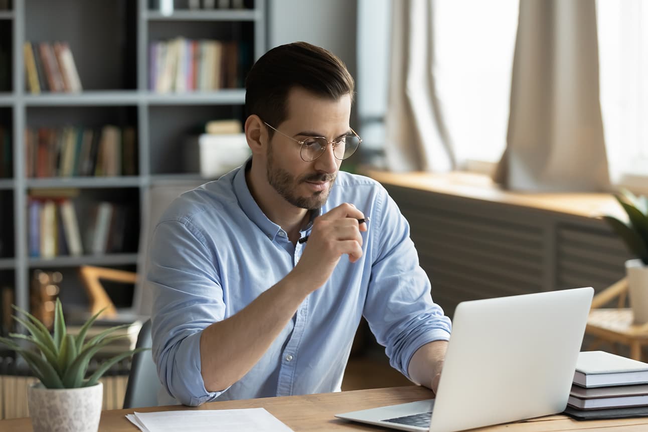 Businessman reviewing his company report